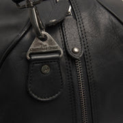 
Solid Antique Brass Hardware & Heavy-Duty Dual Zipper Detail on Rivaro Full-Grain Leather Weekender Bag