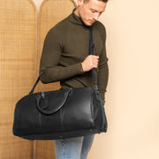 
William Full-Grain Leather Weekender Bag - Structured Side Profile Showing Gusset Depth & Expansion Capacity