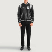 
Liberte New York Black Leather Varsity Jacket - Lateral Side Profile View Showing Sleeve Cut & Athletic Taper Fit