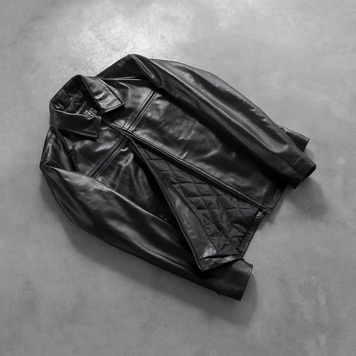 
Styled Fit Perspective of Men's Mystical Black Leather Jacket on Model - Natural Daylight Drape
