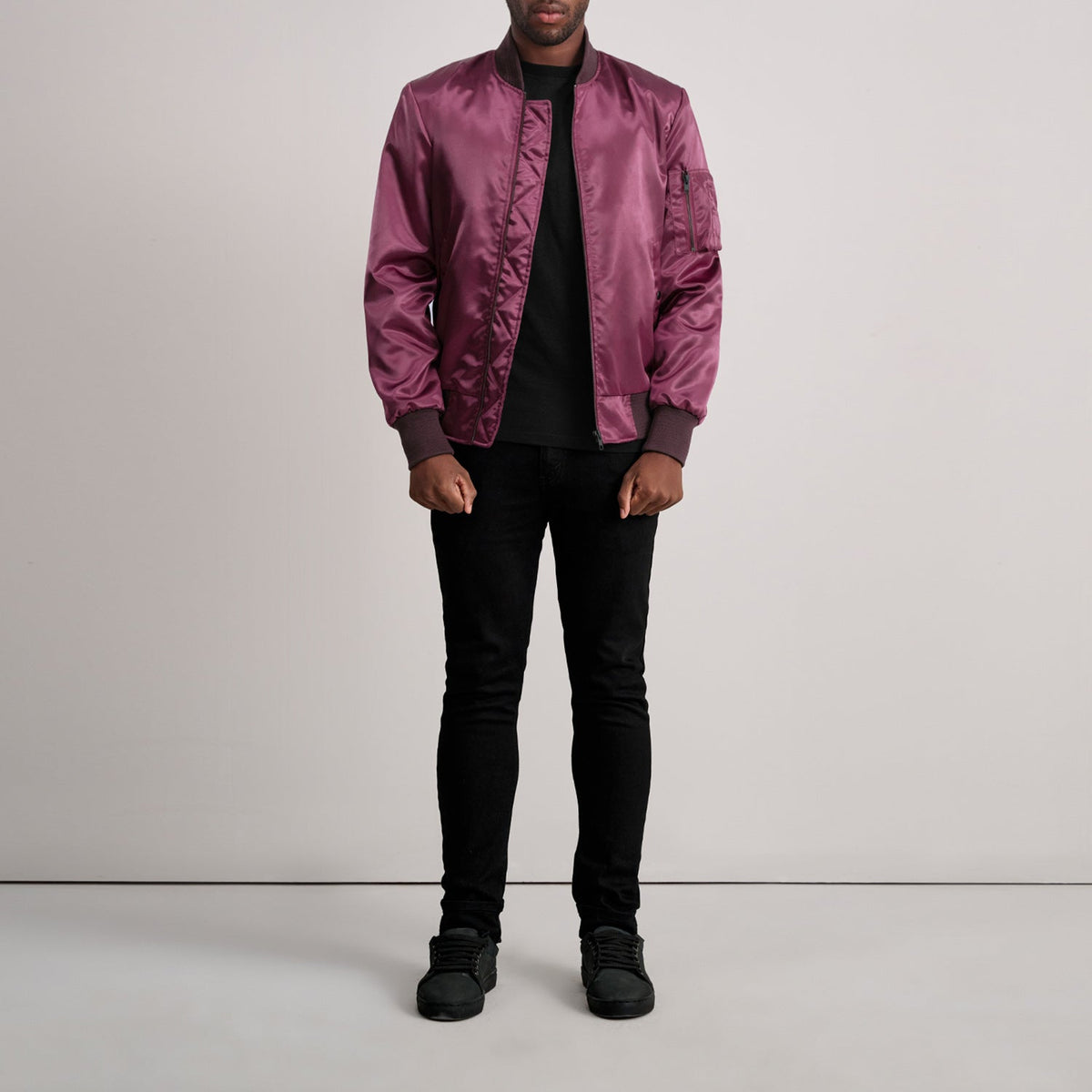 
Close-Up Detail of Varsity & Zipper Hardware on Quinton MA-1 Maroon Bomber Jacket